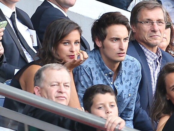 Malika Ménard et son frère Raphaël assistent au match PSG-Bastia le 16 août 2014 à Paris.
