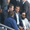 Jalil Lespert et Brahim Asloum assistent au match PSG-Bastia pour la 2ème journée 2014/2015 au Parc des Princes le 16 août 2014 à Paris.