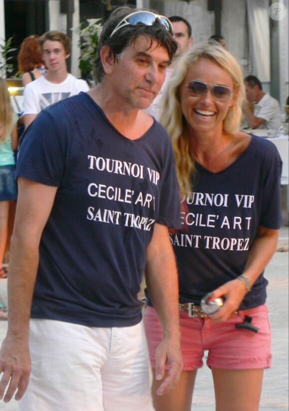 Tex et Cécile de Menibus - Tournoi de pétanque sur la place des Lices à Saint-Tropez. Le 12 août 2014 14/08/2014 - Saint-Tropez