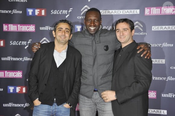 Eric Toledano, Omar Sy et Olivier Nakache à Paris le 14 février 2012.