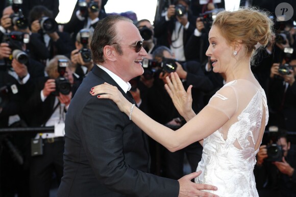Quentin Tarantino, Uma Thurman complices au Festival du film de Cannes le 24 mai 2014.