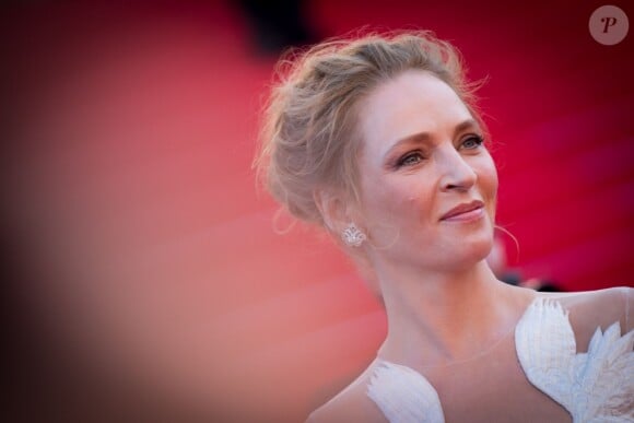 Uma Thurman radieuse à Cannes le 24 mai 2014.