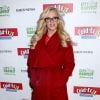 Jenny McCarthy participe à une collecte de nourriture pour "Care to Feed the Hungry Canned Food Drive" à New York, le 12 décembre 2013.