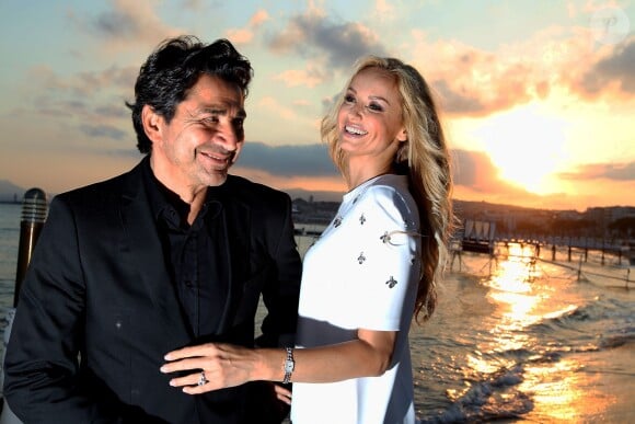 Adriana Karembeu et son mari Aram Ohanian - Adriana est l'invitée d'honneur de la soirée caritative pour soutenir les associations RMC/BFM et Rayon de Soleil de Cannes, à l'occasion des 10 ans de la Plage Z du Grand Hyatt Hotel Martinez à Cannes le 27 juin 2014.