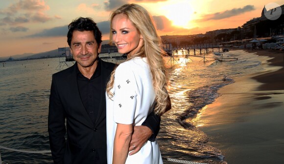 Adriana Karembeu et son mari Aram Ohanian - Adriana est l'invitée d'honneur de la soirée caritative pour soutenir les associations RMC/BFM et Rayon de Soleil de Cannes, à l'occasion des 10 ans de la Plage Z du Grand Hyatt Hotel Martinez à Cannes le 27 juin 2014.