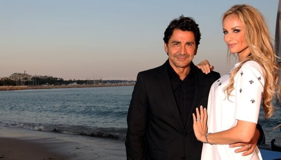 Adriana Karembeu et son mari Aram Ohanian - Adriana est l'invitée d'honneur de la soirée caritative pour soutenir les associations RMC/BFM et Rayon de Soleil de Cannes, à l'occasion des 10 ans de la Plage Z du Grand Hyatt Hotel Martinez à Cannes le 27 juin 2014.