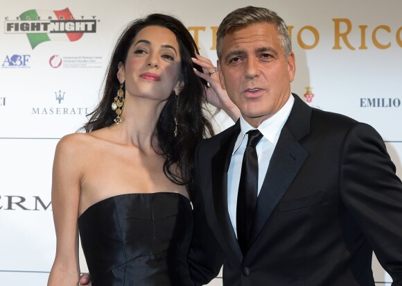 George Clooney et sa fiancée Amal Alamuddin au gala de charité Celebrity Fight Night, en faveur de la Fondation Andrea Bocelli et du Centre Parkinson Mohamed Ali, au Palazzo Vecchio à Florence, le 7 septembre 2014.