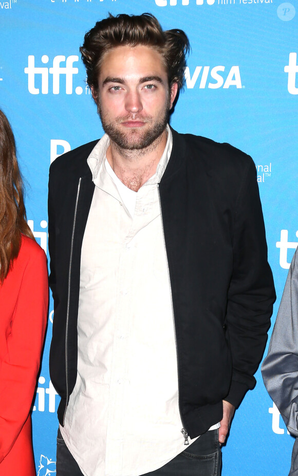 Robert Pattinson lors du photocall du film "Maps To The Stars" au Festival du film de Toronto. Le 9 septembre 2014.