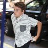 Cooper, le fils de Melissa Rivers, arrive à l'appartement de Joan Rivers à New York. Le 4 septembre 2014