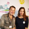 Charity Day BGC 2014 -Benjamin Castaldi et Zoé Felix - Courtier d'un jour pour encourager les clients à passer ce jour là le maximum d'ordres dans la salle des marchés d'Aurel BGC Rue Vivienne à Paris. Le 11 septembre 2014