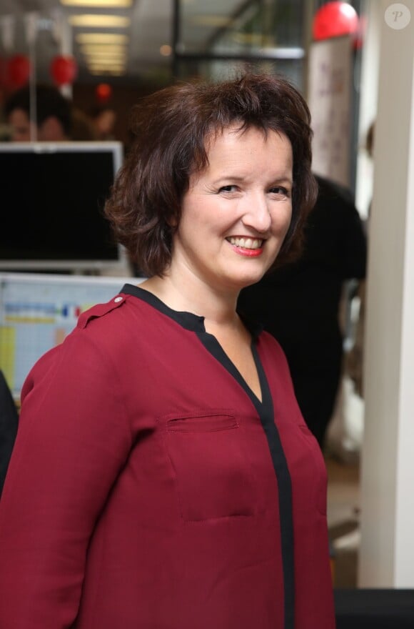 Charity Day BGC 2014 - Anne Roumanoff - Courtier d'un jour pour encourager les clients à passer ce jour là le maximum d'ordres dans la salle des marchés d'Aurel BGC Rue Vivienne à Paris. Le 11 septembre 2014