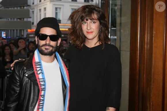 Gunther Love et sa compagne Daphné Bürki - Arrivées au dernier défilé de mode "Jean-Paul Gaultier", collection prêt-à-porter printemps-été 2015, au Grand Rex à Paris. Le 27 septembre 2014