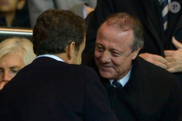 Nicolas Sarkozy et Bernard Lacombe lors du match entre le PSG et Lyon à Paris, le 16 décembre 2012