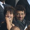 Patrick Bruel et sa compagne Caroline - Match PSG-Barcelone de la Ligue des Champions au parc des princes à Paris le 30 septembre 2014. Le PSG à remporté le match sur le score de 3-2.