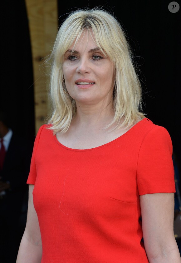 Emmanuelle Seigner - Arrivées au défilé de mode "Miu Miu", collection prêt-à-porter printemps-été 2015, à Paris. Le 1er octobre 2014 
