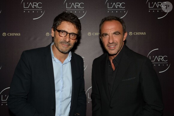 Pascal Elbé et Nikos Aliagas - Inauguration de la discothèque L'Arc à Paris le 2 octobre 2014.
