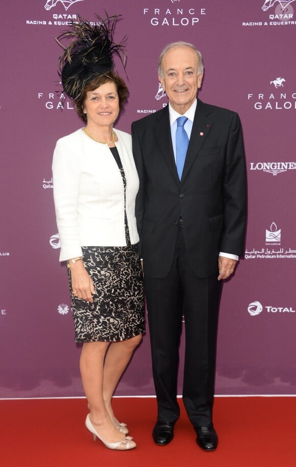 Bertrand Bélinguier et sa femme Nathalie lors du Qatar Prix de l'Arc de Triomphe à l'hippodrome de Longchamp à Paris, le 5 octobre 2014