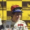 Andrea De Cesaris, second au volant de son Alfa Romeo au côté du champion du monde Nelson Piquet, troisième sur Brabham BMW lors du Grand Prix d'Afrique du Sud, sur le circuit de Kyalami le 15 octobre 1983