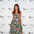 Olga Kurylenko (en Matthew Williamson) - Dîner de gala "IWC" à Londres le 7 octobre 2014.
