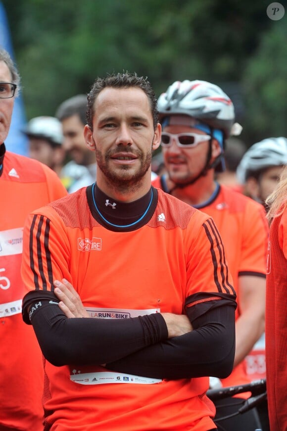 Michaël Llodra - La troisième édition de la "Run & Bike Solidaire" au profit du Secours populaire français organisée à Paris sur le Domaine national de Saint-Cloud, le 12 octobre 2014.