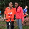 Jimmy Vicaut et Muriel Hurtis - La troisième édition de la "Run & Bike Solidaire" au profit du Secours populaire français organisée à Paris sur le Domaine national de Saint-Cloud, le 12 octobre 2014.