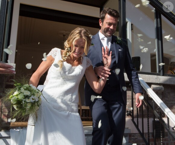 Mariage civil de l'animatrice Sandrine Corman et Michel Bouhoulle (professeur de tennis et consultant sur la RTBF, chaîne de télévision belge) à la mairie de Lasne, près de Bruxelles en Belgique, le 12 septembre 2014.