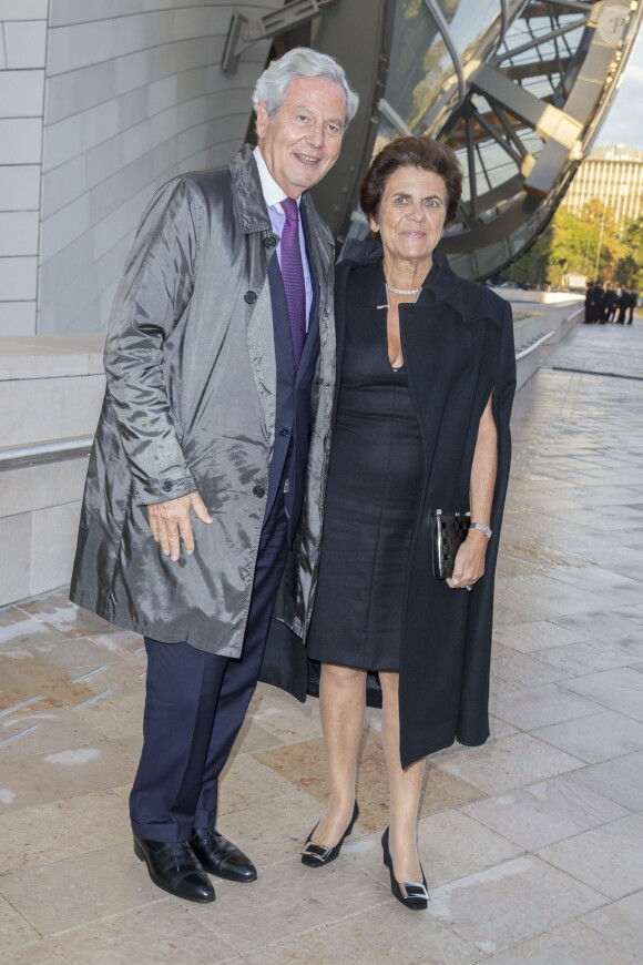 Philippe Houzé, President du Directoire des Galeries Lafayette et sa femme - Inauguration du musée de la Fondation Louis Vuitton à Paris le 20 octobre 2014. 