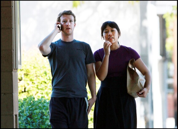 MARK ZUCKERBERG (PATRON DE FACEBOOK) ET SA PETITE AMIE PRISCILLA CHAN A PALO ALTO 5871320 The youngest ever self-made billionaire , Facebook CEO Mark Zuckerberg, enjoyed sunday afternoon with his girlfriend Priscilla Chan in Palo Alto, CA, October 10, 2010 in the same shirt that he sported out yesterday with a pal. The happy couple strolled around the farmers market and then enjoyed a Jewish festival that took place near by. Priscilla pumps her own gas as Mark hung out in the car. Zuckerberg certainly doesn't appear to be an average billionaire at all. His personal Facebook profile page, he lists his personal interests as "openness, making things that help people connect and share what's important to them, revolutions, information flow, and minimalism." A lifestyle motto to which he is clearly sticking to by driving an extremely economical Honda Fit and living way under his means in a rented small yet cozy home in Palo Alto, Ca. His cloths are obviously not flashy, expensive or brand new. But Zuckerberg is choosing to spend his massive earnings on a greater purpose. Last week he created a Start-Up Education Foundation and gifted the city of Newark, New Jersey a breathtaking 0 million dollars to aid in the city?s desperately hurting public school system. And while this grand gesture coupled with an appearance on the Oprah Winfrey show is all thought to be a strategic move to counter negative publicity from Aaron Sorkin?s film ?The Social Network.? about Zuckerberg, which premiered in New York City the very same week. Zuckerberg claims that he intends to continue his mission for education!10/10/2010 - PALO ALTO