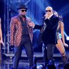 Pitbull et Ne-Yo perform lors des American Music Awards à Los Angeles, le 22 novembre 2014.