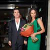 Simon Cowell et sa femme Lauren Silverman à la sortie de la soirée caritative "The Katie Piper" à Londres, le 27 novembre 2014.