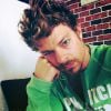 Vincent La Torre avec les cheveux bouclés mi longs sur son compte Instagram (été 2014).