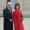 Le roi Carl Gustav et la reine Silvia de Suède au palais de l'Elysée où ils ont eu un déjeuner et un entretien avec François Hollande, à Paris le 2 décembre 2014