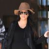 Kourtney Kardashian en pleine séance de shopping en compagnie de sa famille à Los Angeles Le 29 Novembre 2014