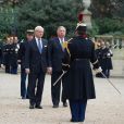  Le roi Carl XVI Gustaf de Su&egrave;de et G&eacute;rard Larcher, pr&eacute;sident du S&eacute;nat, &agrave; Paris le 2 d&eacute;cembre 2014 