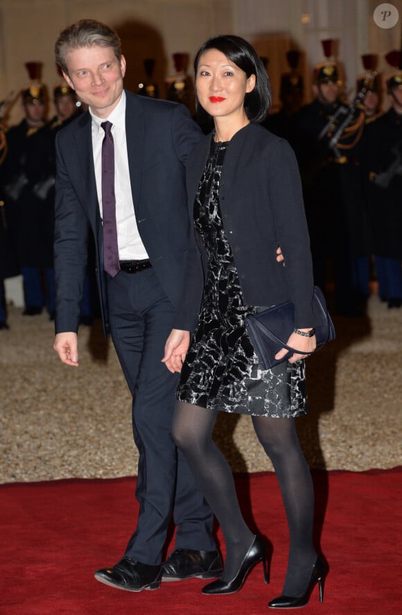 Fleur Pellerin et son mari Laurent Olléon lors du dîner donné par François Hollande en l'honneur du roi de Suède Carl XVI Gustaf et son épouse la reine Silvia au palais de l'Elysée le 2 décembre 2014 à Paris