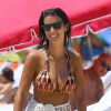 Le footballeur international français, Bacary Sagna, fait du jet-ski avec sa sublime femme Ludivine à Miami, le 19 juillet 2014