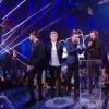 Les One Direction remportent le prix du Groupe-duo international de l'année, le samedi 13 décembre lors des NRJ Music Awards 2014.
