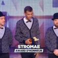 Stromae reçoit un trophée d'honneur lors de la soirée des NRJ Music Awards 2014, à Cannes, le samedi 13 décembre 2014 sur TF1.