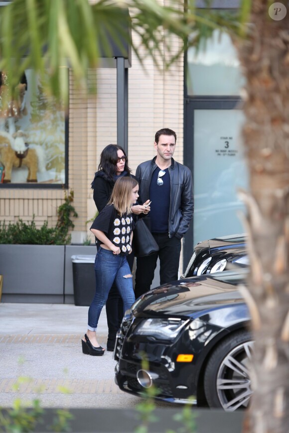 Courteney Cox, son fiancé et sa fille, Coco, sont allés faire du shopping chez Barney's à Los Angeles, le 18 décembre 2014.