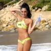 Brina Chantal, ravissante en bikini jaune, prend part à un shooting pour 138 Water sur une plage de Malibu. Le 12 décembre 2014.