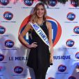  Miss France 2015 Camille Cerf lors de l'émission de radio : "La matinale Spéciale Noël sur RFM" dans les studios de RFM à Paris, le 19 décembre 2014. 