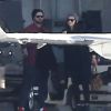 Jessica Biel enceinte et son mari Justin Timberlake prennent un jet privé avec des membres de leur famille à l'aéroport de Van Nuys, le 28 décembre 2014.