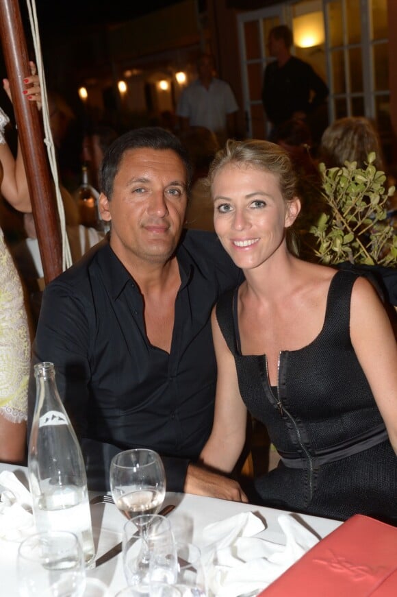 Dany Brillant et sa femme Nathalie à la Soirée Marcel Campion au restaurant La Bouillabaisse à Saint-Tropez. Le 6 août 2014 