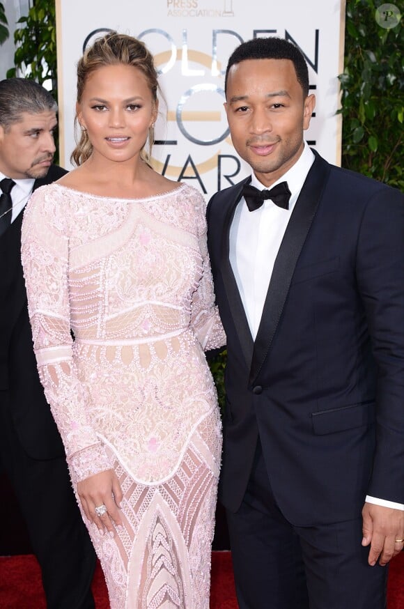 Chrissy Teigen et son mari John Legend arrivent aux 72eme Golden Globe Awards le 11 janvier 2015