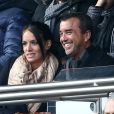 Arnaud Lagardère et sa femme Jade Foret, complices - au match de de la ligue 1 entre le PSG et Evian au Parc des Princes à Paris le 18 janvier 2014. Le Psg à remporté le match sur le score de 4 buts à 2. Il y a eu une minute d'applaudissements pour les attentats de la semaine dernière "Ici, c'est Charlie"