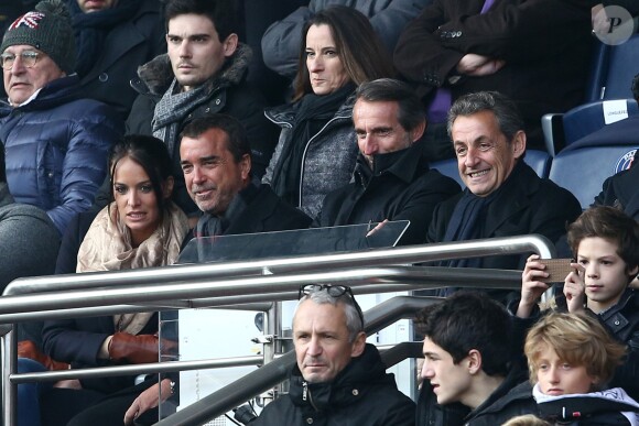 Arnaud Lagardère et sa femme Jade Foret près de Nicolas Sarkozy - au match de de la ligue 1 entre le PSG et Evian au Parc des Princes à Paris le 18 janvier 2014. Le Psg à remporté le match sur le score de 4 buts à 2. Il y a eu une minute d'applaudissements pour les attentats de la semaine dernière "Ici, c'est Charlie"