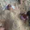 Beyoncé recouverte de sable, où l'on devine une sculpture de baby-bump - photo publiée sur son compte Instagram le 11 janvier 2015