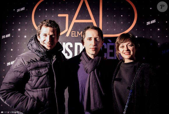 Exclusif - Gad Elmaleh entre Guillaume Canet et sa compagne Marion Cotillard, lors de la dernière représentation de Gad Elmaleh au Palais des Sports de Paris, pour fêter ses 20 ans de scène, le 20 décembre 2014.