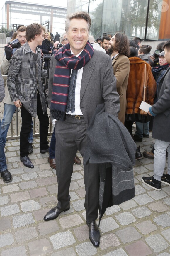 Le chanteur Bryan Ferry arrive au Parc André Citroën pour assister au défilé homme Louis Vuitton automne-hiver 2015-2016. Paris, le 22 janvier 2015.