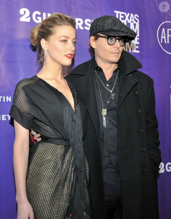 Amber Heard et son fiancé Johnny Depp à Austin, le 6 mars 2014.
